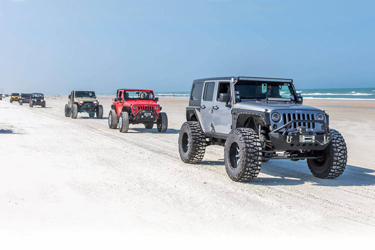 Jeeps Driving on the Beach